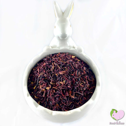 Dried organic hibiscus flowers, cut and sifted.