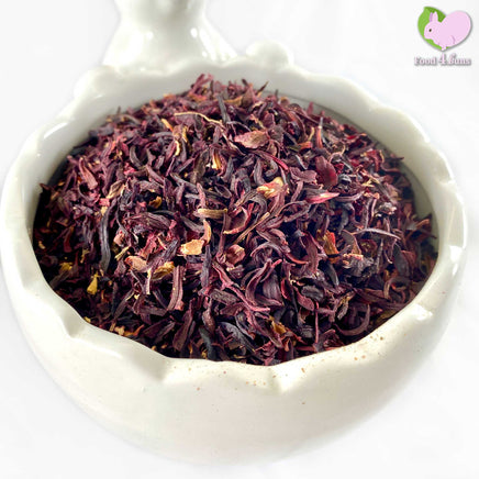 Dried organic hibiscus flowers, cut and sifted.