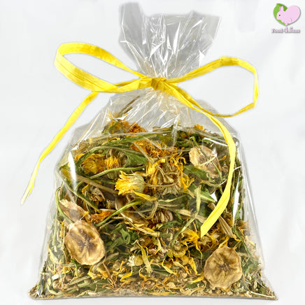 Gift Basket, Spring Gift Set with Somebunny Loves You Mix with self dried Dandelions, Hibiscus, Rosehips and Rosebuds for rabbits, guinea pigs, chinchillas, hamsters, degus and gerbils. Spring Mix with self dried Dandelions and banana chips, Calendulas, Chamomile, Chickweed and Yarrow Flowers. Self dried organic carrot and parsnip slices, bunny socks and fridge magnet. 